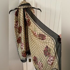 100% SILK Scarf. GG logo. Can be worn multiple ways. Black border. Stunning